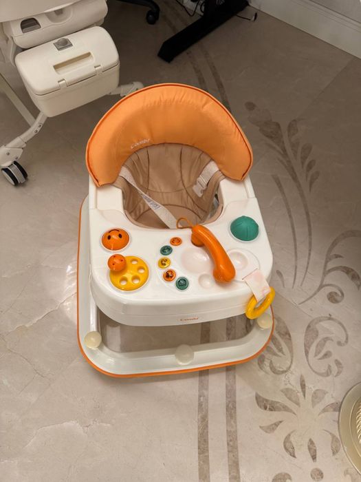 Дитячі ходунки Combi