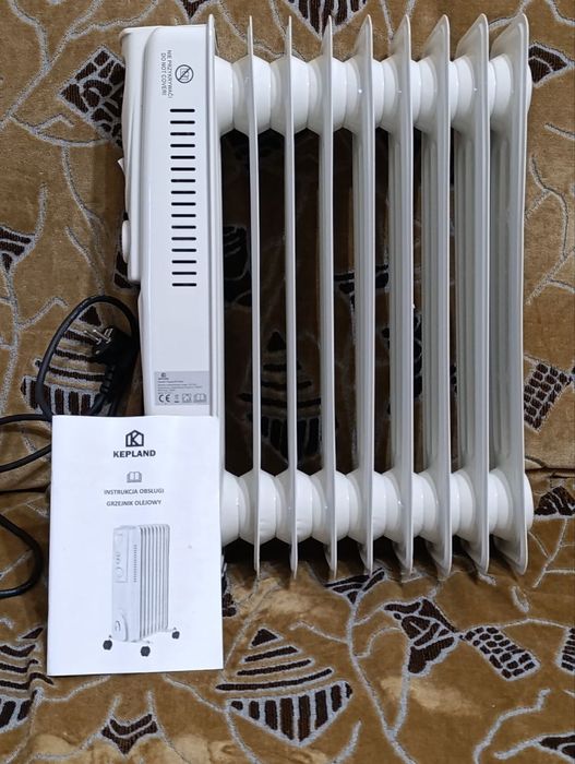 Новый масляный обогреватель Kepland 2000W.