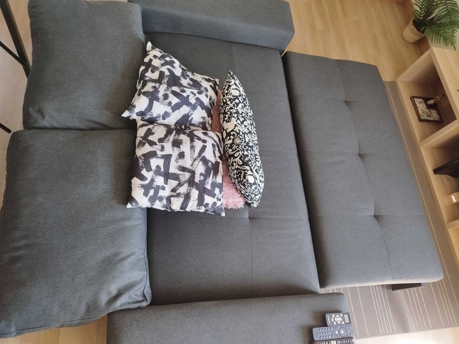 Vendo sofá-cama cinza em bom estado. (1x1,80)