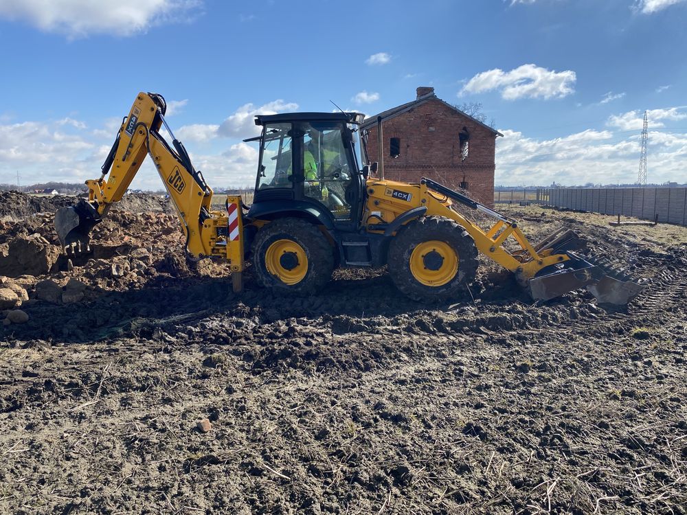 Uslugi koparko ładowarką jcb cat z operatorem