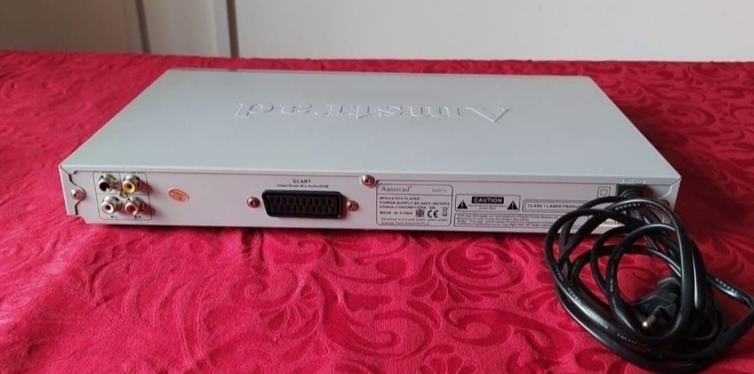 LeitorLeitor de DVD Amstrad DX4015

- Cabo de ligação à T.V.
- Sem com
