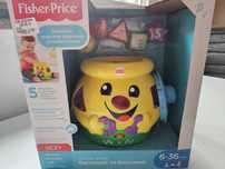 Garnuszek na klocuszek marki Fisher-Price