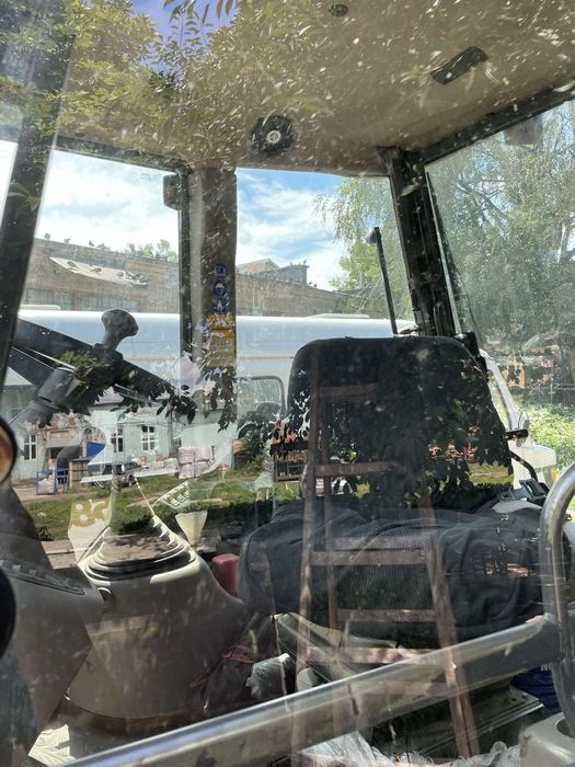 Екскаватор Case 580SR