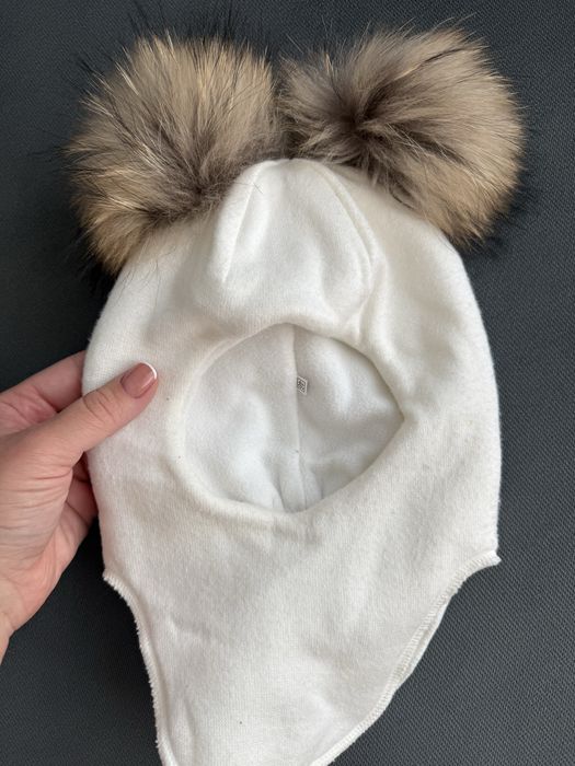 Продам шапку , мех натруланый