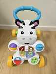 Fisher-Price Interaktywny Chodzik Zebra z muzyką i wypowiedziami