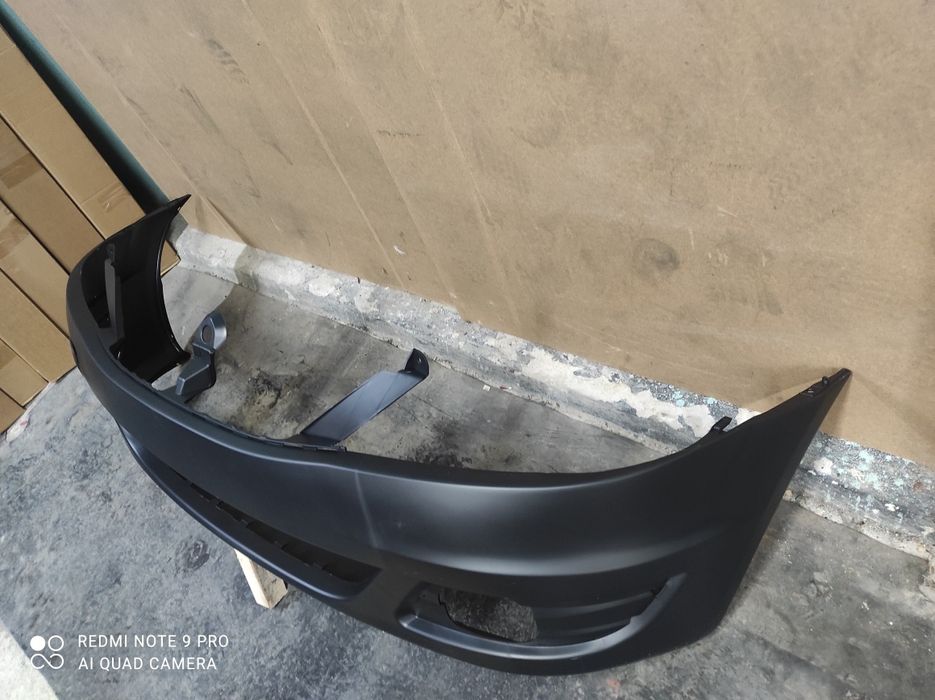 Бампер передній Dacia Logan логан