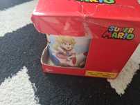 Kubek w stylu Super Mario, jeszcze w pudełku