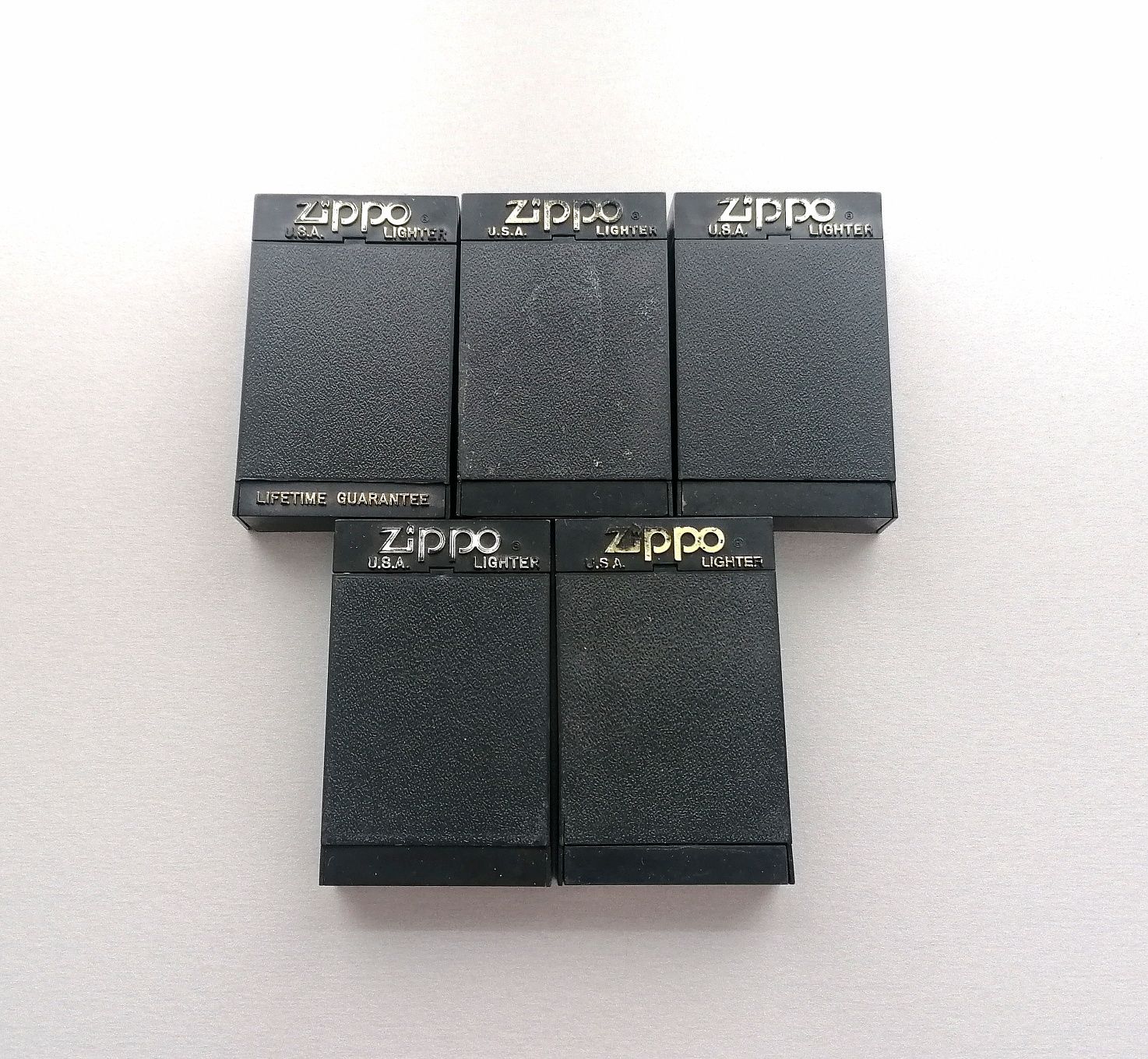 Zestaw 5 starych pudełek Zippo z lat 90