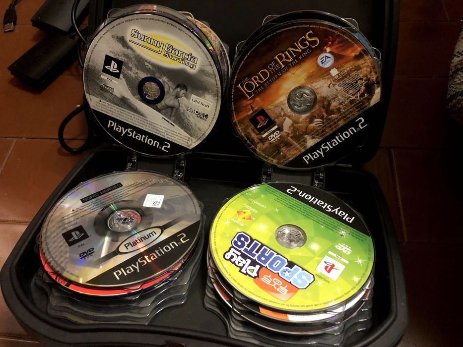 Playstation 2 + cartão memória/jogos/microfone singstar/câmara eye toy