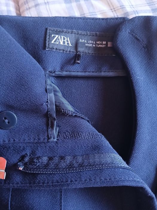 Calças cintura subida