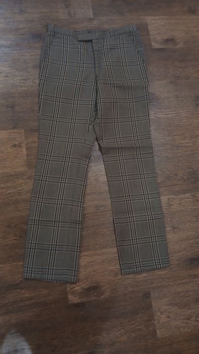Штани -палацо чорні та в клітинку