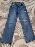 Spodnie jeans,szerokie nogawki"Noisy May".