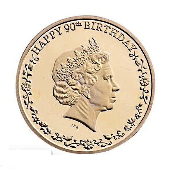 сувенир-монеты Карла III и королевы Елизаветы II