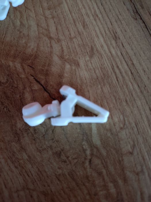 Żabki do karnisza 17 szt plastikowe białe