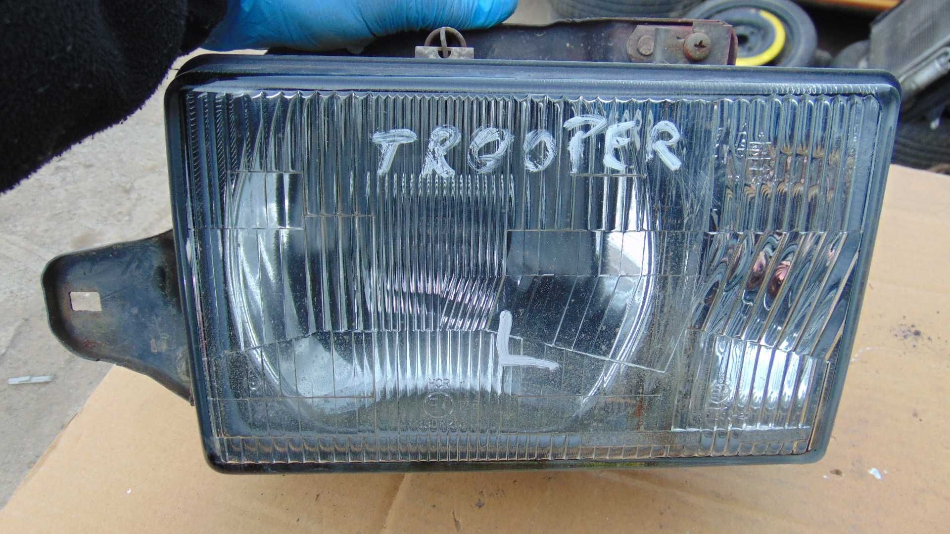 Cze55 Lampa przednia lewa isuzu trooper EU wysyłka