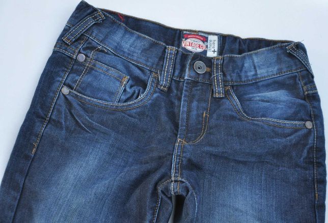 C&A spodnie granatowe jeansy na podszewce r 134