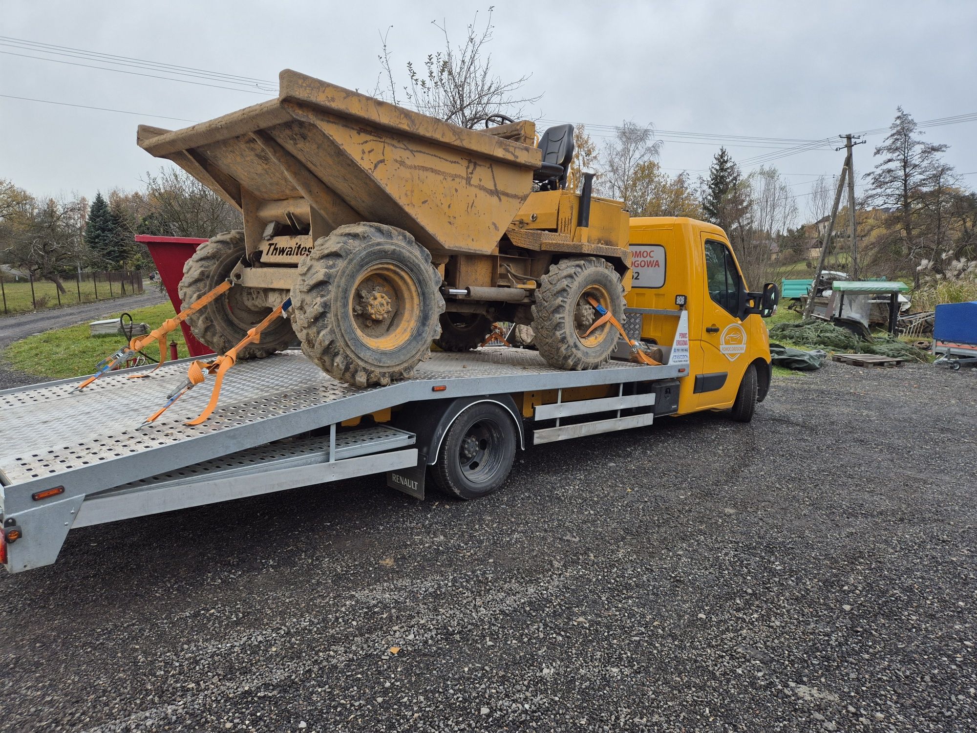 Pomoc drogowa holowanie autolaweta transport aut transport koparek