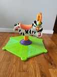 Fisher Price Skoczek Zebra Rodeo