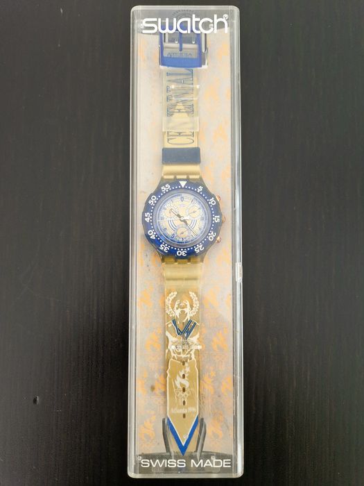 Relógio Swatch Aqua Chrono Olympic Special (SBZ102) NIKIPHOROS