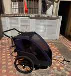 Atrelado de bicicleta para crianças