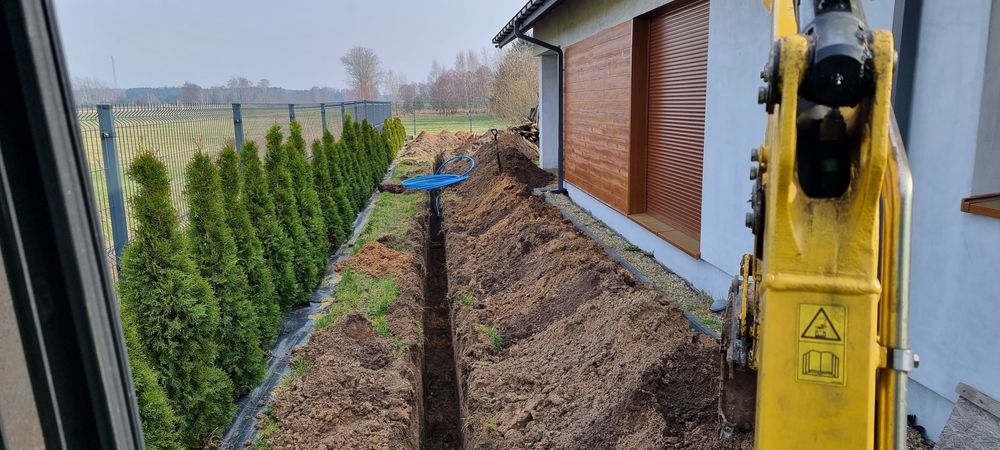 Budowa zbiorników  koparka czyszczenie rowów stawów wynajem