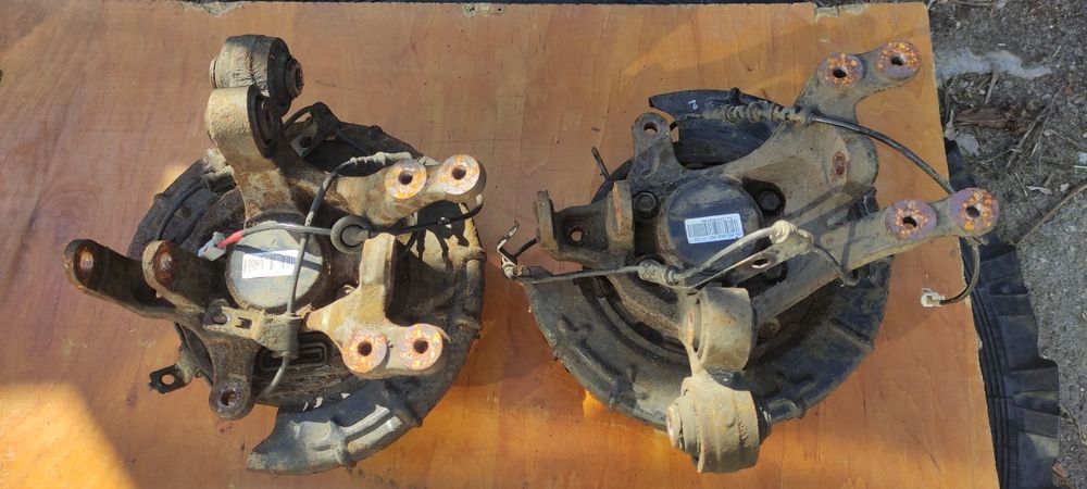 Цапфа (поворотный кулак) задняя Kia Sportage III SL,Киа Спортедж 3