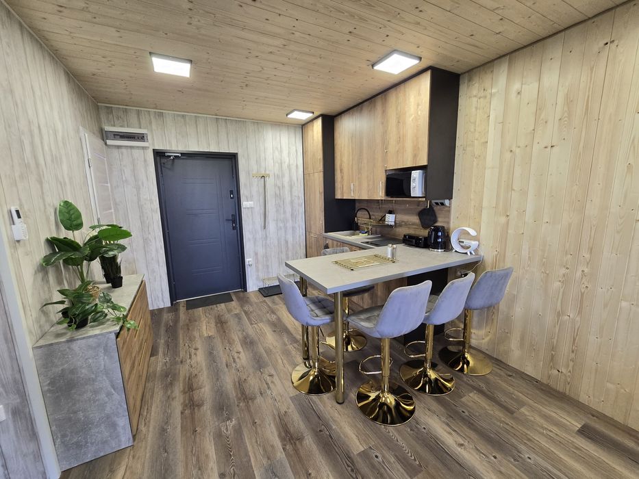 Domek wynajem z sauna jacuzzi ogniskiem najczystsze jezioro Polski