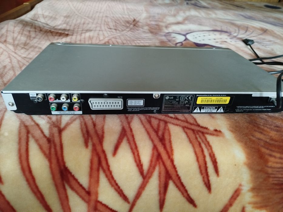 Продам DVD протгрыватель LG,без соединительных проводов в рабочем сост