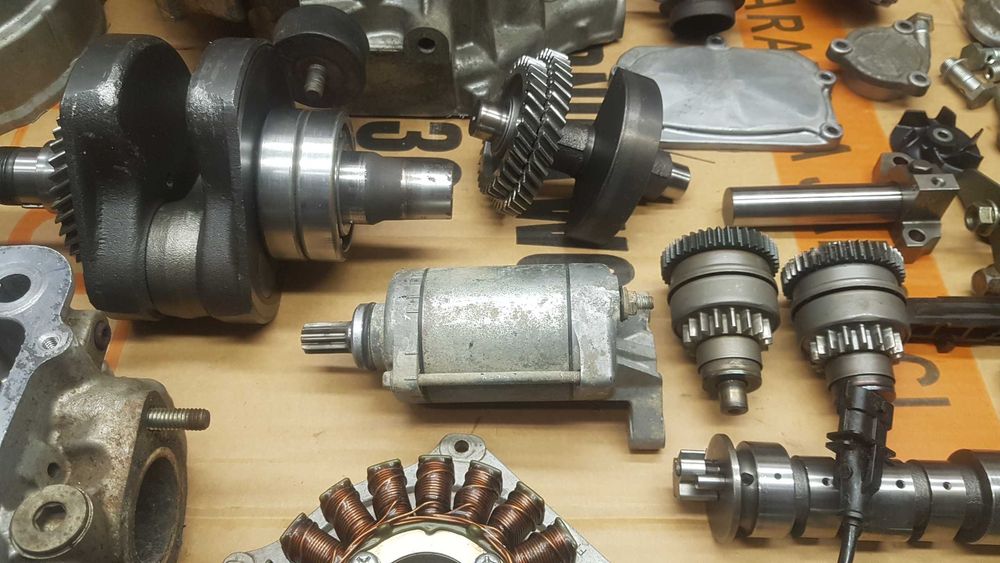 polaris 500 sportsman kartery glowica wal stator magneto slizg pompa