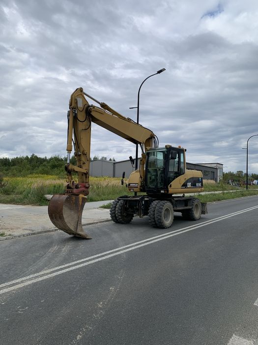 Caterpillar CAT M 316C z Niemiec 9700mth 313 315