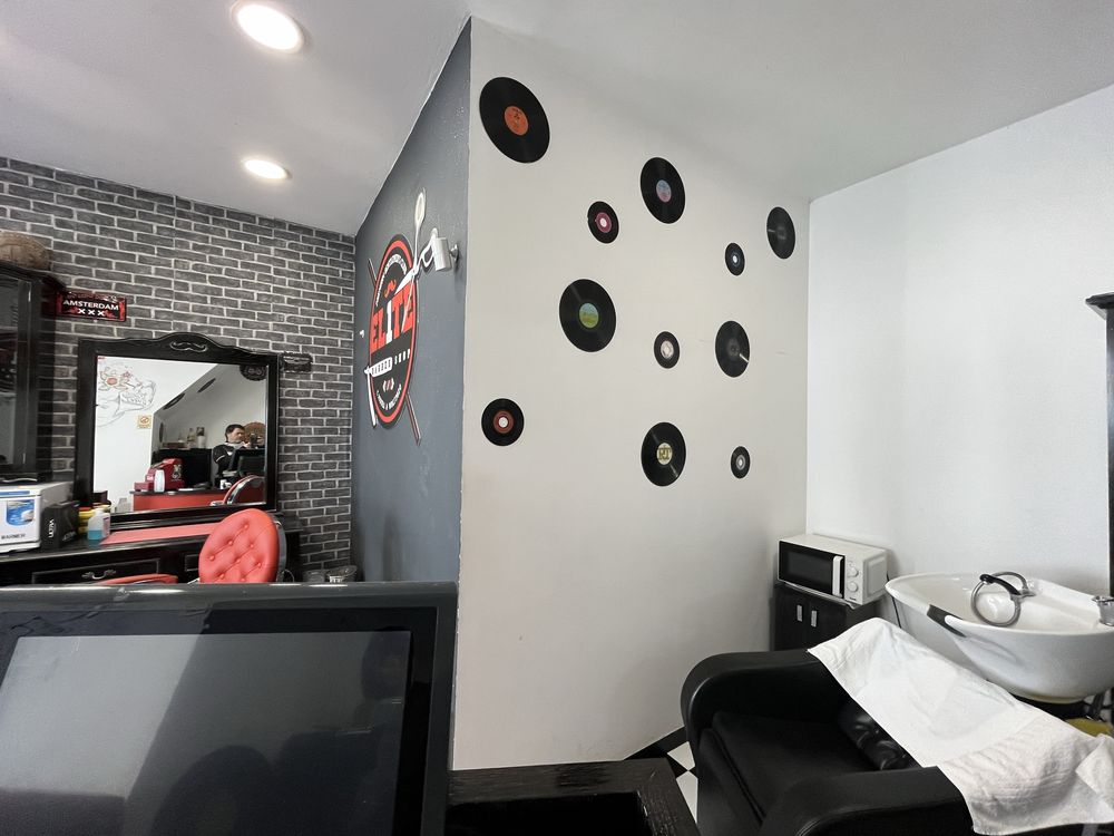 Cadeira em barbearia no Porto