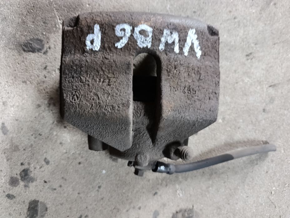 Zacisk hamulcowy przód prawy volkswagen passat b6