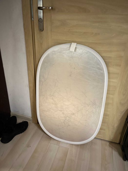 Blenda fotograficzna owalna srebrno-biała 60x90cm z pokrowcem