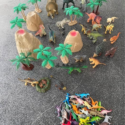 Dinossauros figuras com volcanos