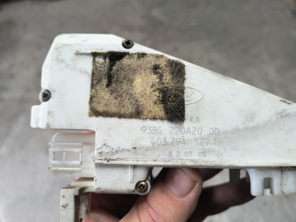 Zamek siłownik drzwi ford 93bg220a20dd