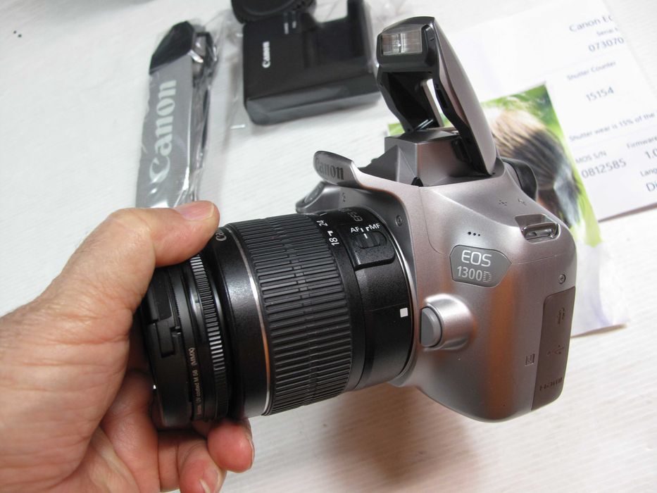 canon 1300D+18-55 só 15 mil disparos como NOVA