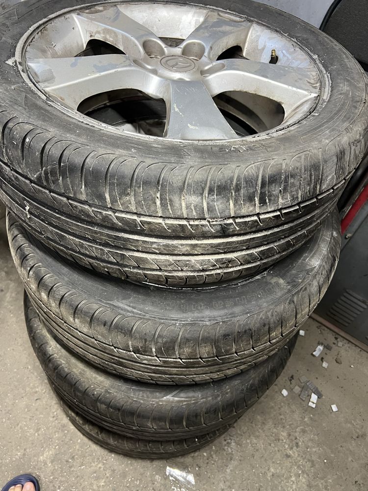 Диски тітани з резиною r17 5/114,3