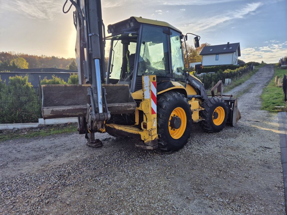 Koparko ładowarka volvo bl71 case cat jcb