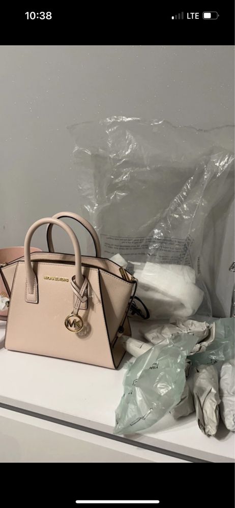 Torebka Michael Kors różowa z paskiem