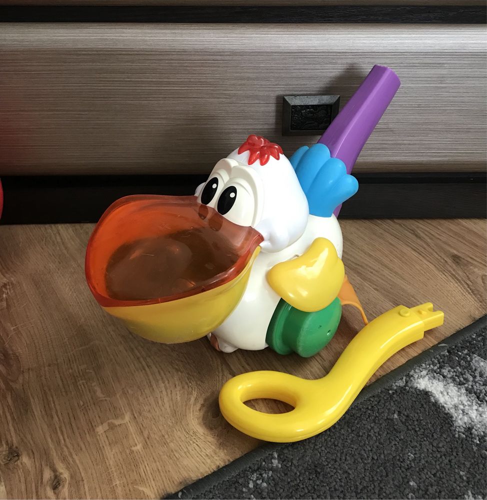 Дитяча розвиваюча іграшка Пелікан