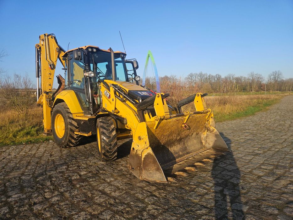 Koparko-ładowarka CAT 428 • 2022 rok