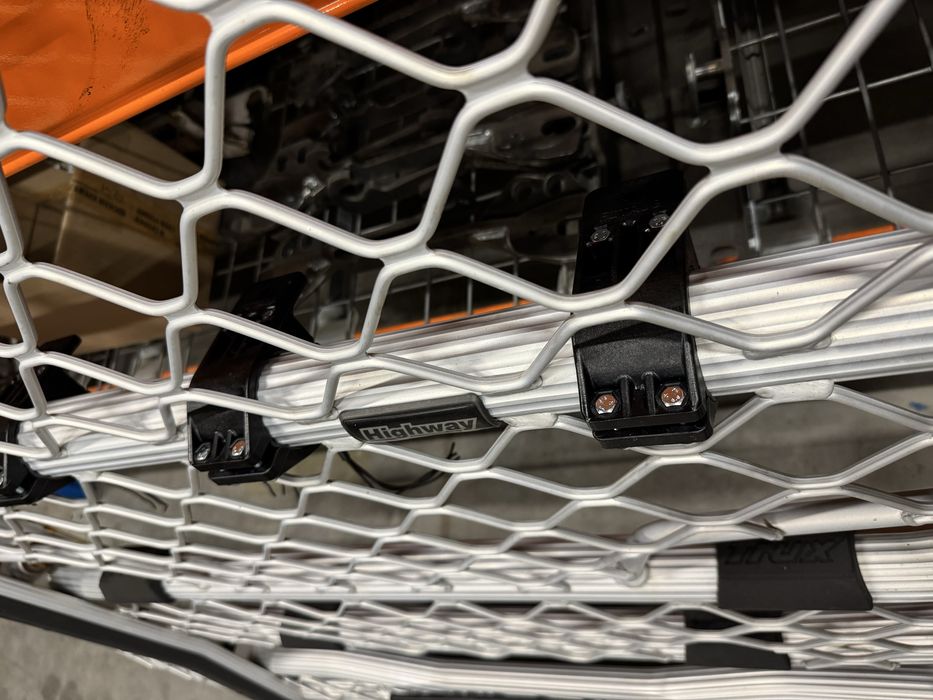 Uchwyty halogeny Hella led Luminator do orurowania Hypro Trux