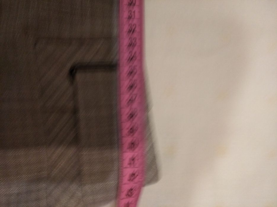 Світла спідниця в дрібну клітинку