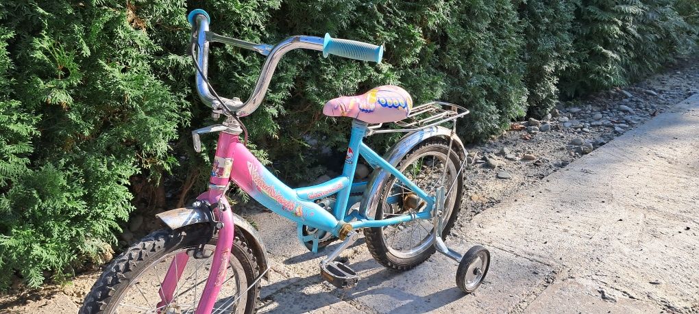 Велосипед дитячий для дівчинки рожевий з багажником