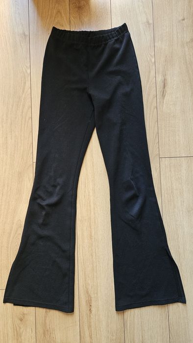 Spodnie materiałowe dzwony Urban outfitters