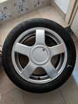 Alufelgi 4x100 z oponami 195/50 R15 82V, dystansami 25mm i dłuższymi ś