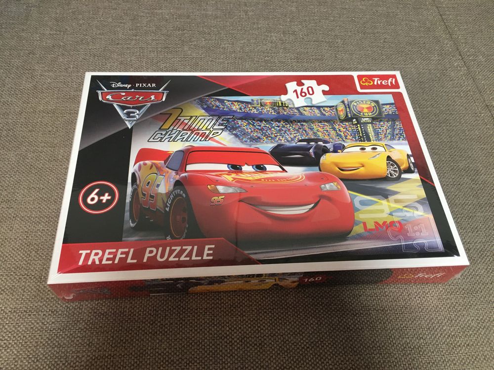 Trefl puzzle wiek 5+ i 6+ 100 i 160 el. Cars Auta Zyg-Zag McQueen