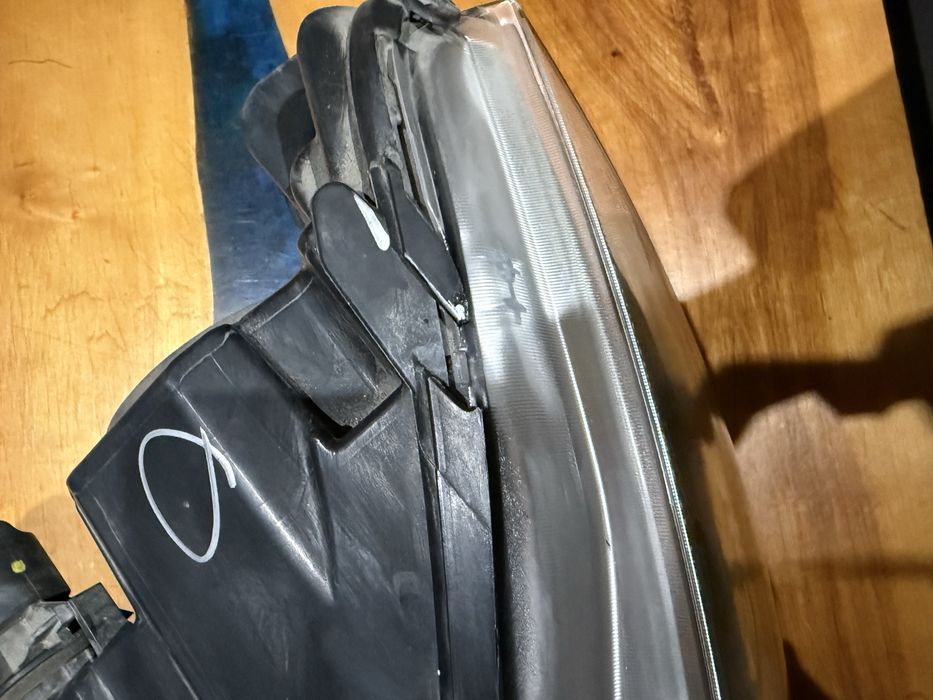 Фара ліва передня модел с 14 рік