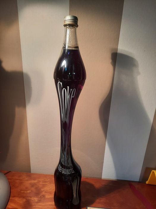 Coca-Cola  de litro, estilizada, 45 anos