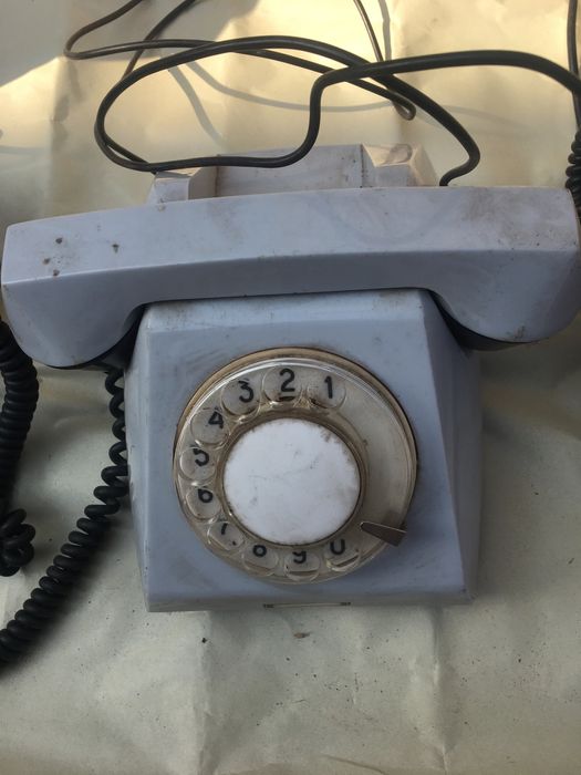Стационарный телефонный аппарат,радиотелефон,трубка телефониста